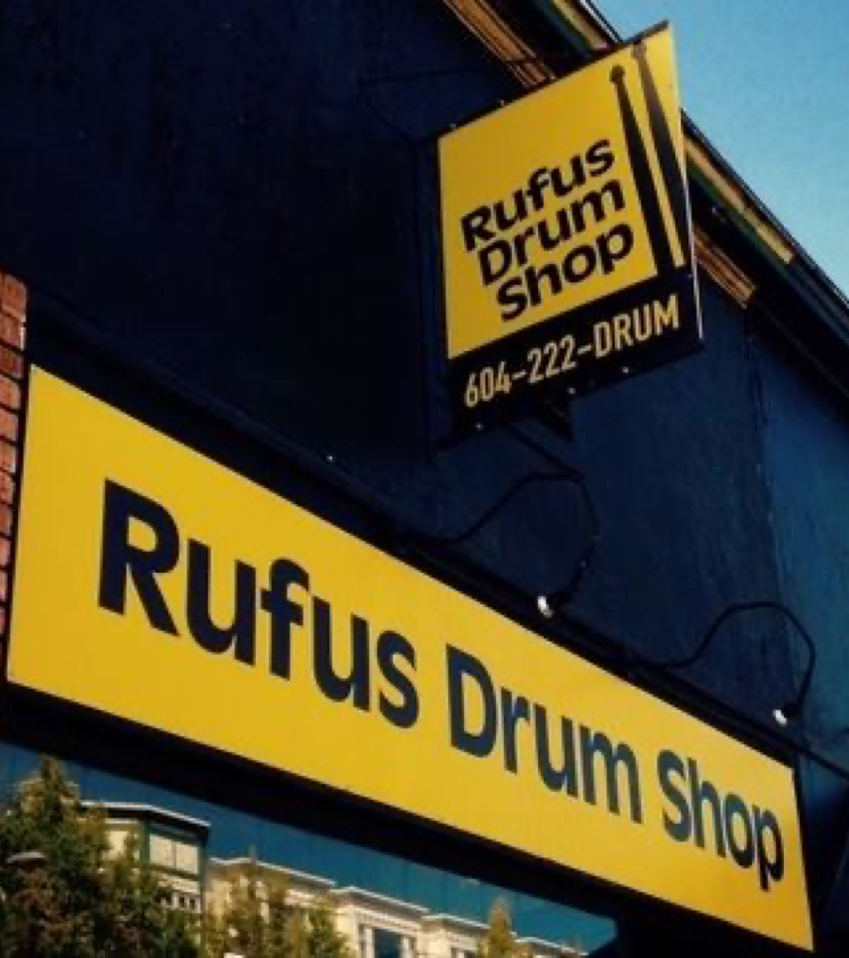 rufus-guitar-and-drum-store-sign
